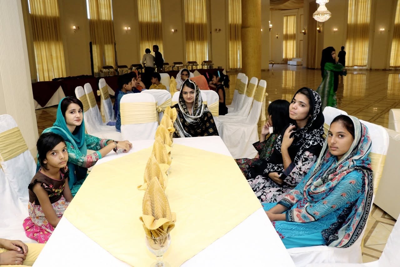 Guests seated at a Primecastle event table