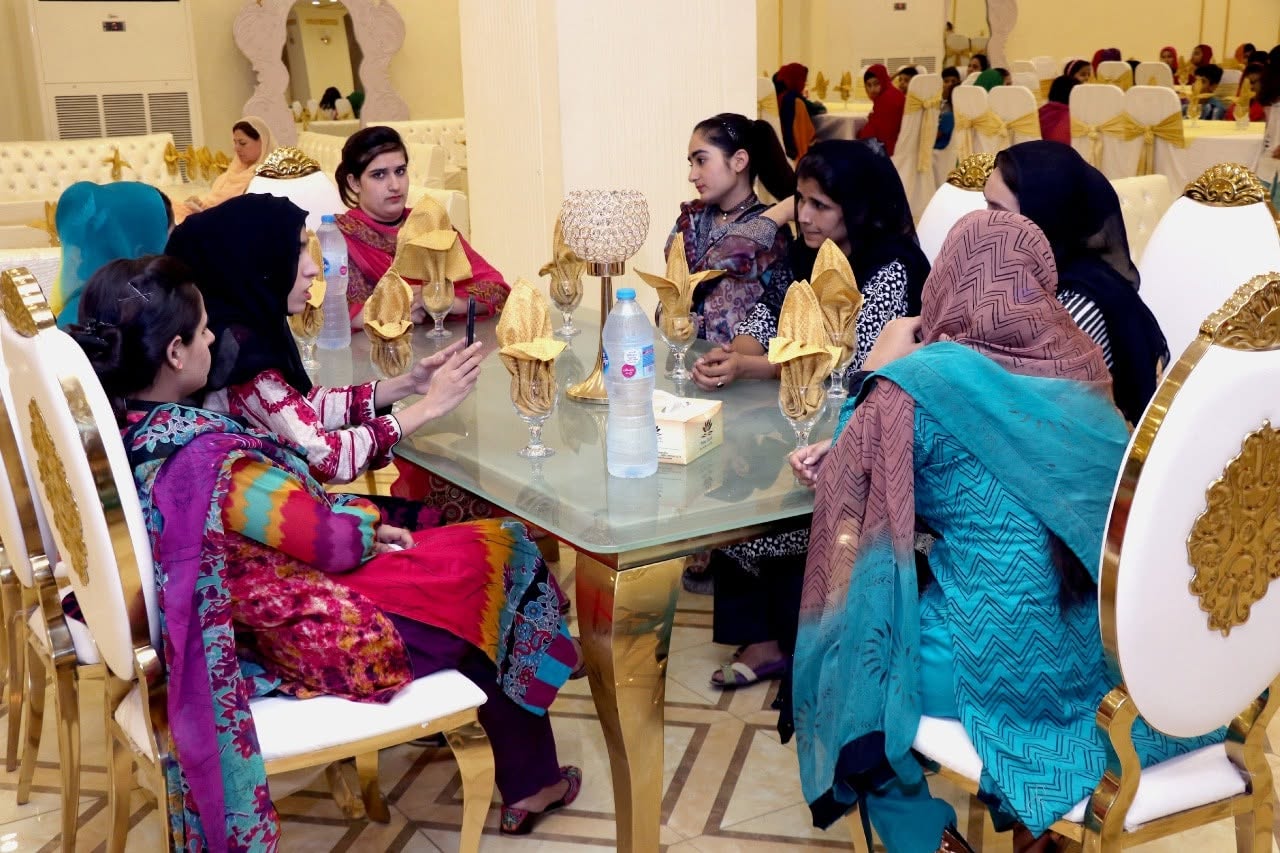 Guests gathered around a decorated event table
