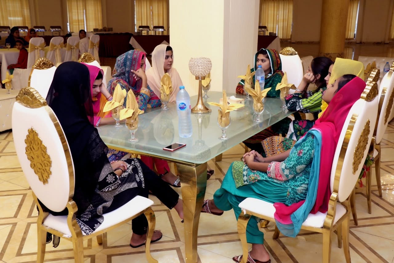 Guests seated at a celebration table